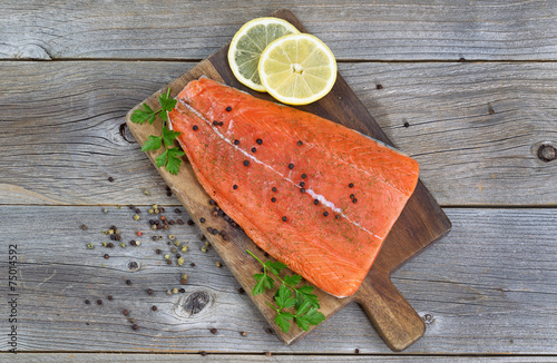 Salmon Fillet seasoned and ready for cooking photo