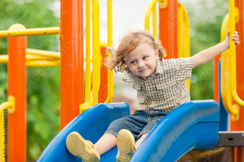 Happy little boy on the playground