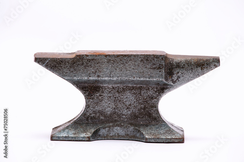 Old rusty rugged anvil.
