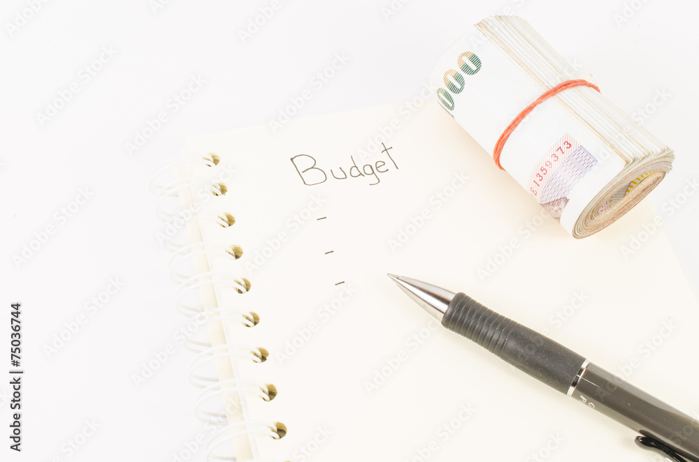 budget list recorded in notebook with white background budget list recorded in notebook with white background