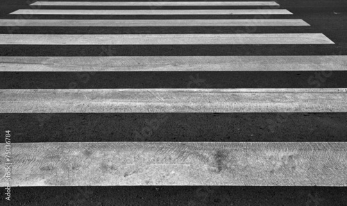 Zebra pedestrian crossing as urban background image.
