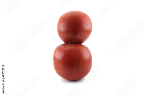 Two red ripe tomatoes. Isolated object on white background. © svetlana485