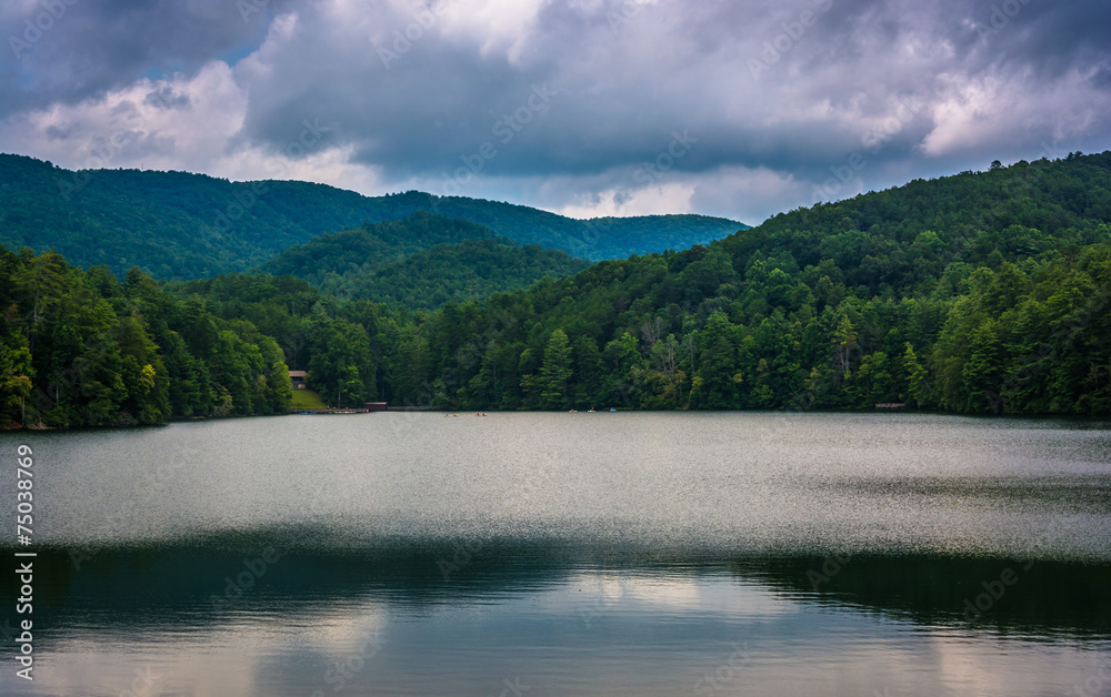 Storm clouds and mountains reflecting in Unicoi Lake, at Unicoi