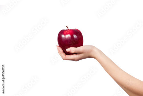Woman's hand holding and showing a  apple on white background