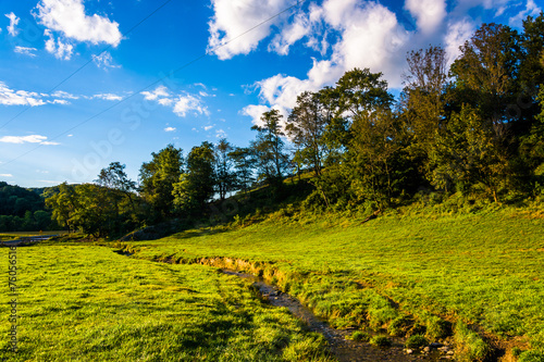 A small stream through a field in rural York County, Pennsylvani photo