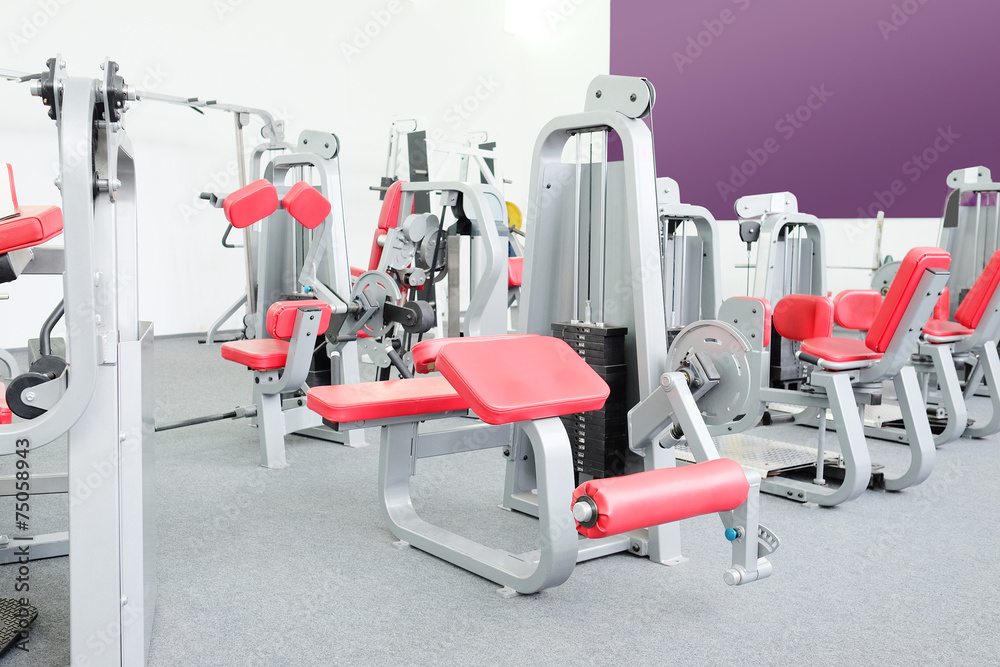 interior of gym with equipment interior of gym with equipment