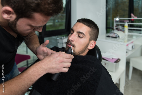 Hairdresser Shaving Man's Mustache