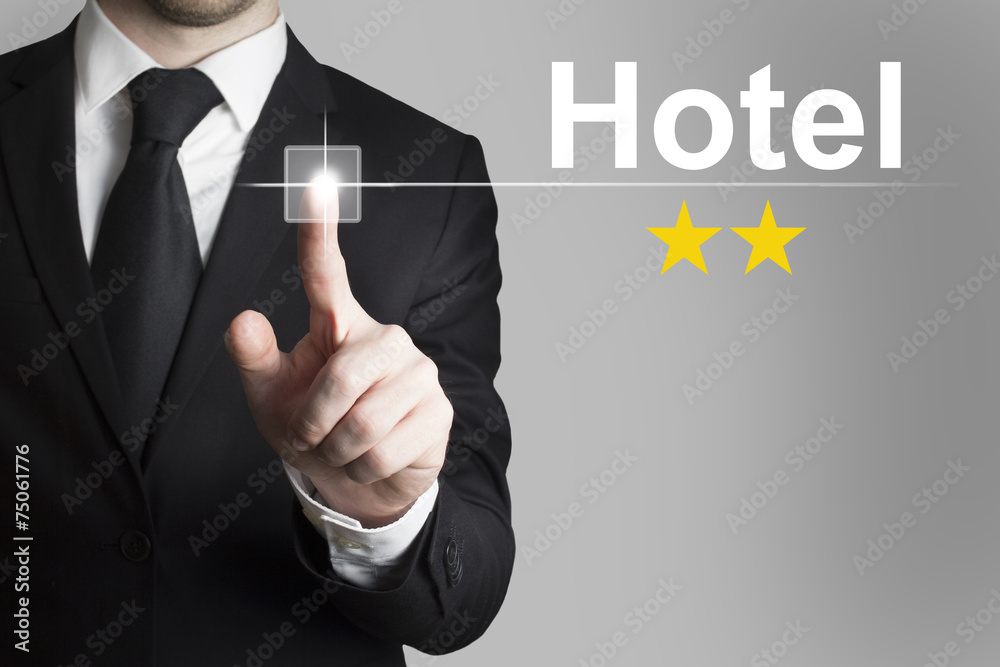 businessman pushing button hotel two stars businessman pushing button hotel two stars