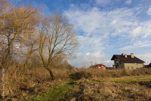 village, fields and sky