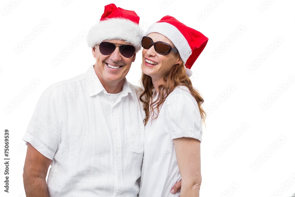 Festive couple smiling at camera Festive couple smiling at camera