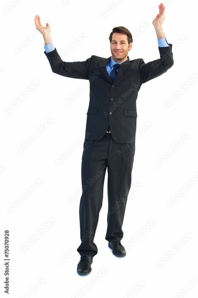 Businessman cheering with hands raised Businessman cheering with hands raised