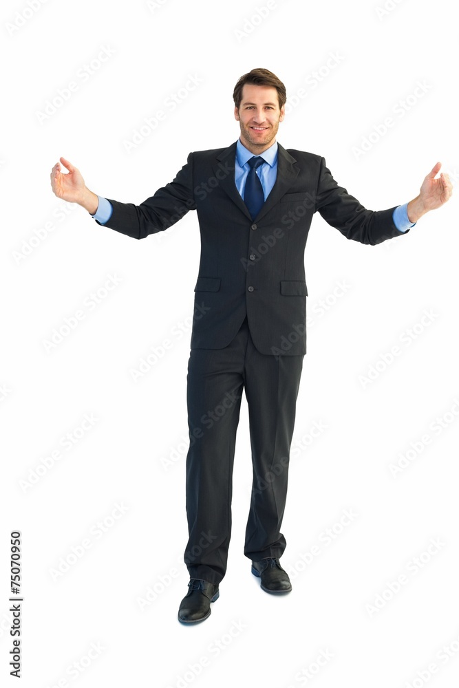 Smiling businessman holding something with his hands Smiling businessman holding something with his hands