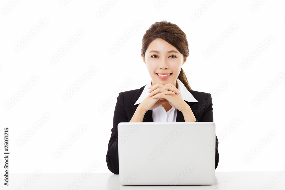 smiling young business woman working with laptop smiling young business woman working with laptop