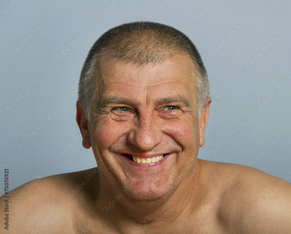 Obraz premium Smiling adult man.