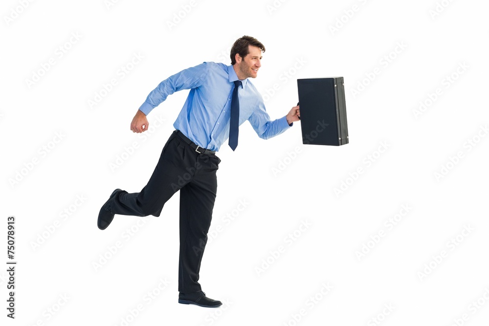 Walking and smiling businessman with suitcase Walking and smiling businessman with suitcase