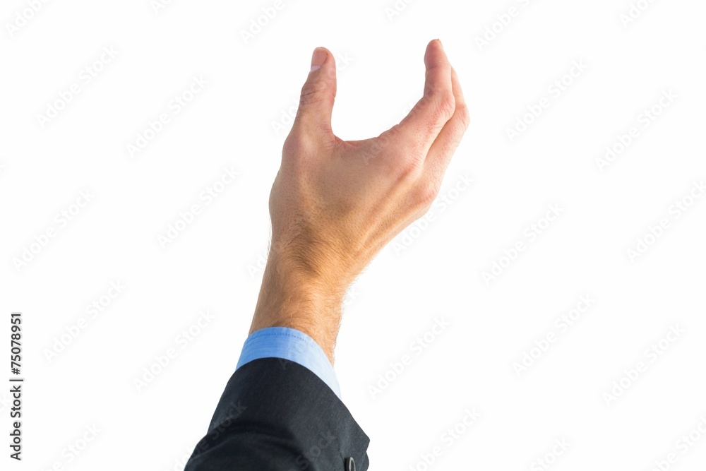 Businessman holding hand out in presentation Businessman holding hand out in presentation