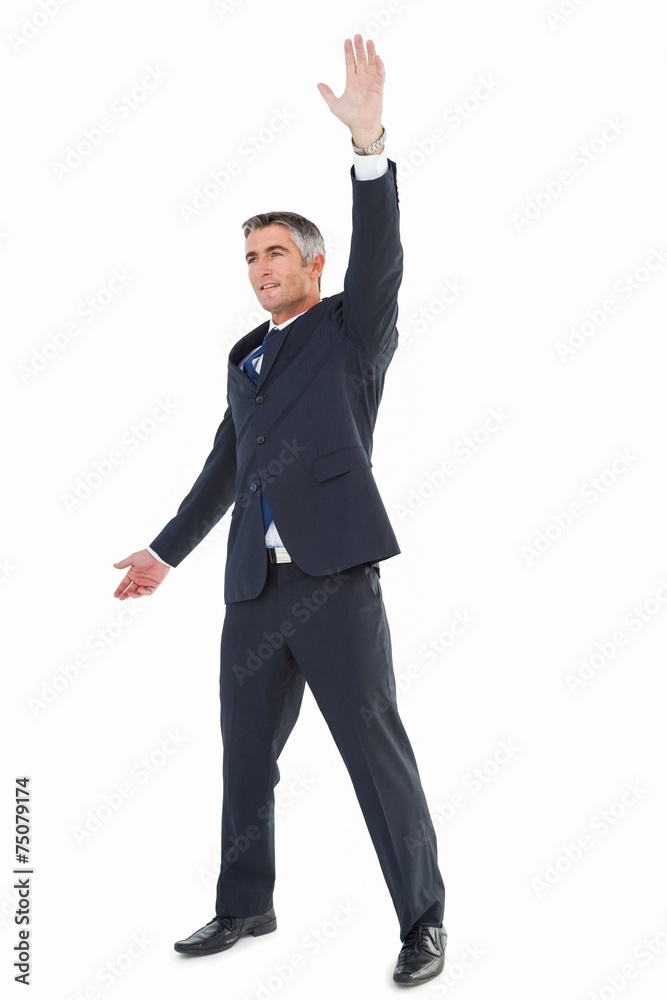 Smiling businessman doing a gesture Smiling businessman doing a gesture