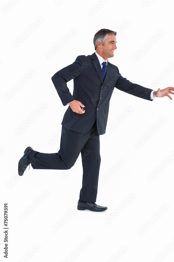 Smiling businessman posing with arms out Smiling businessman posing with arms out