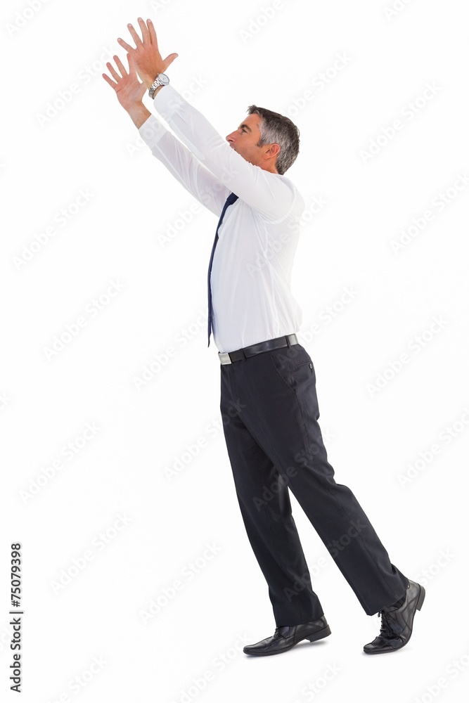 Businessman without jacket catching something Businessman without jacket catching something