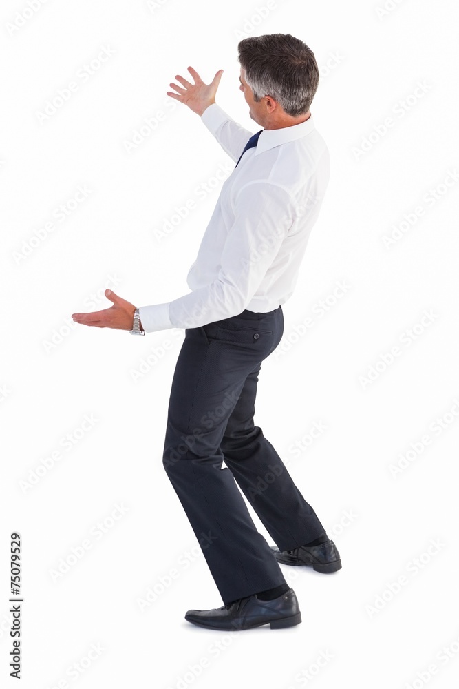 Businessman without his jacket posing with arms out Businessman without his jacket posing with arms out