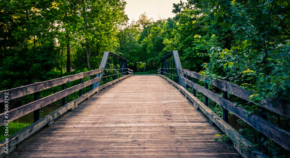 Old wooden bridge over a creek in Southern York County, Pennsylv Old wooden bridge over a creek in Southern York County, Pennsylv