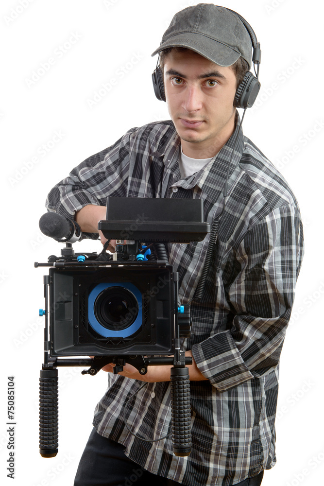 Obraz premium young cameraman and professional camera
