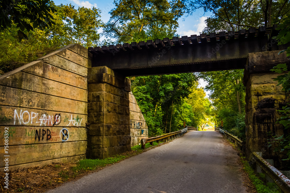 Railroad bridge over a road in rural York County, Pennsylvania.