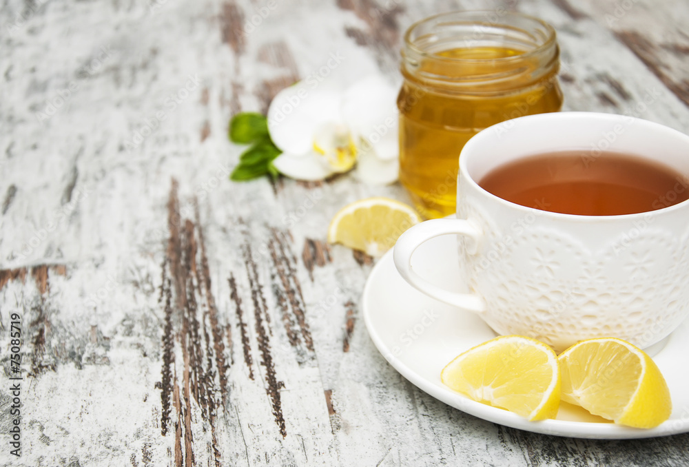 Cup of tea with lemon and honey Cup of tea with lemon and honey
