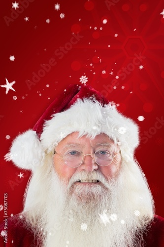 Composite image of santa smiles in the camera