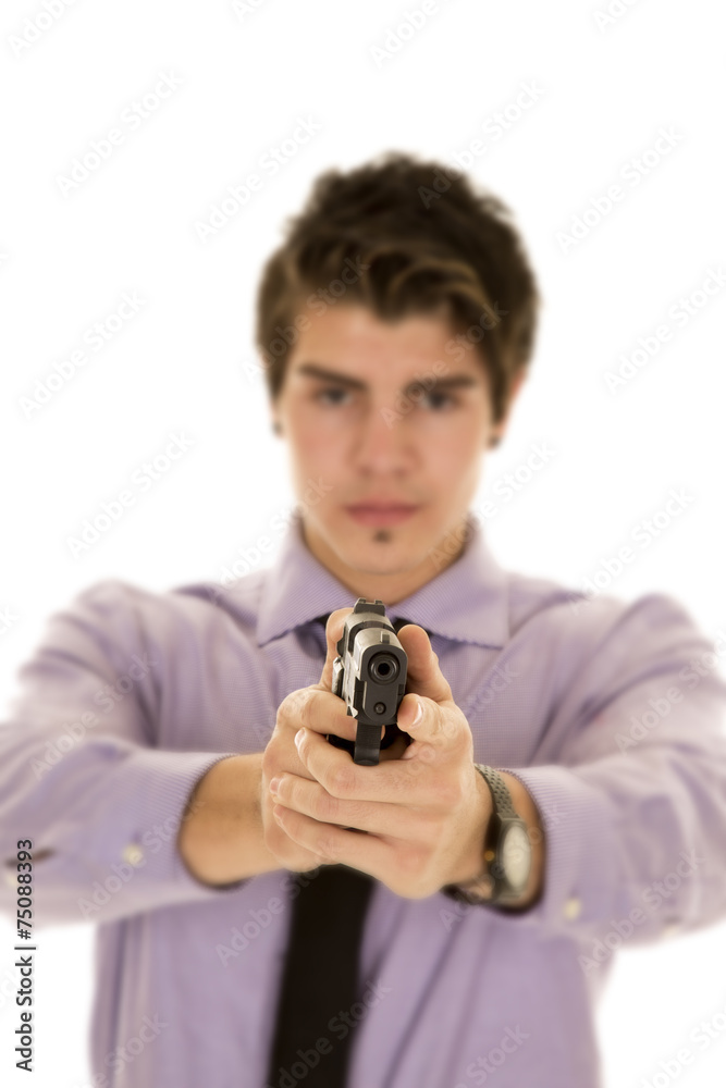 man in purple dress shirt with gun focused on gun