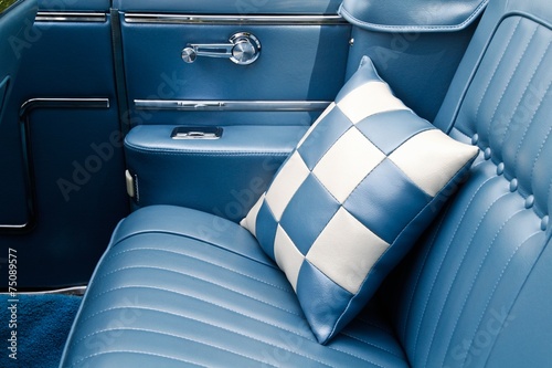 The backseat of a classic car