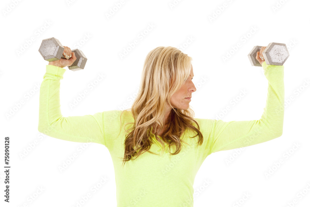 blond woman green top fitness flex weights look side blond woman green top fitness flex weights look side