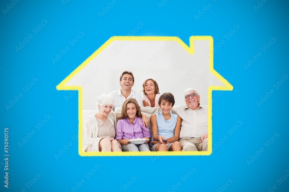 Composite image of multigeneration family on couch watching tv Composite image of multigeneration family on couch watching tv