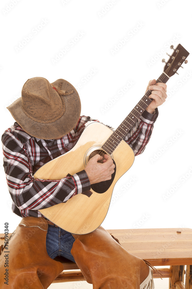 Fototapeta premium cowboy play guitar head down