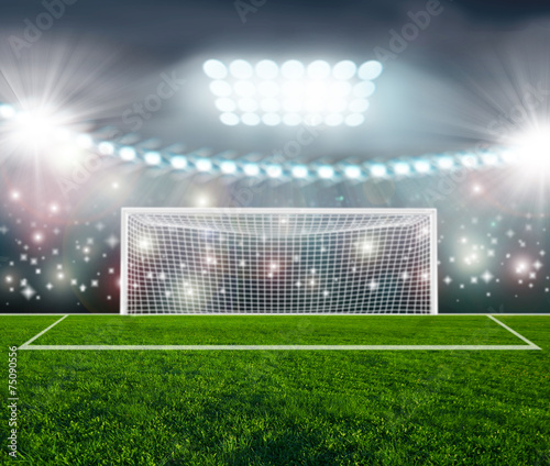 Soccer ball on green stadium arena