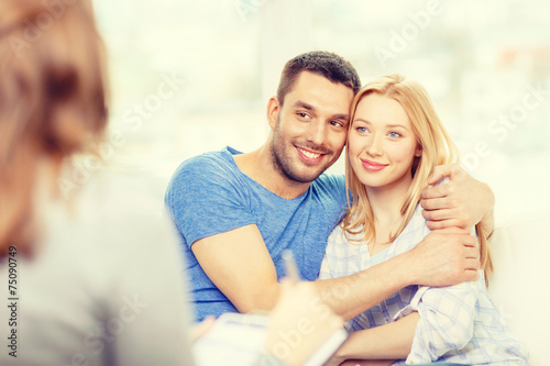 young couple hugging at psychologist office