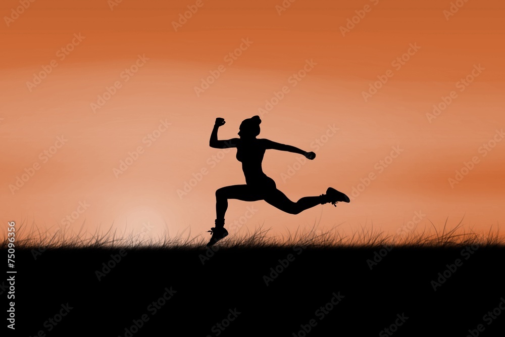 Composite image of fit brunette running and jumping Composite image of fit brunette running and jumping