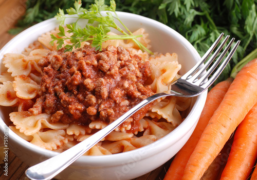 pasta farfalle con ragù di carne alla bolognese photo