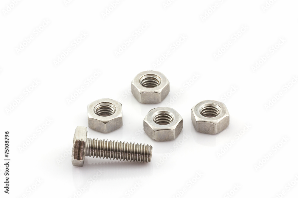 Metal screw and nuts on white background. Metal screw and nuts on white background.
