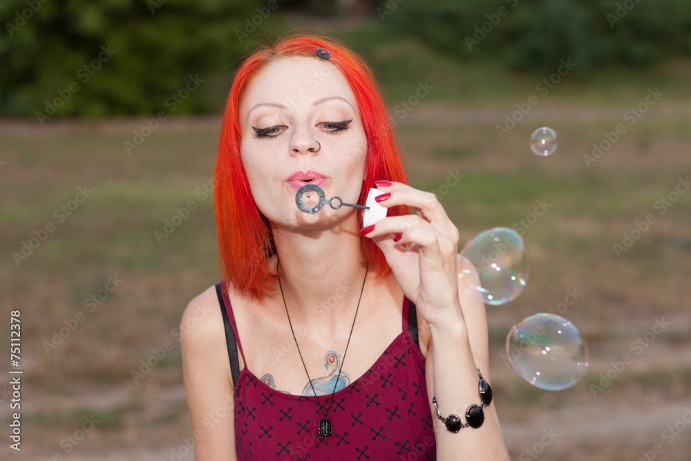 Pretty Girl Blows Bubble near the river Pretty Girl Blows Bubble near the river