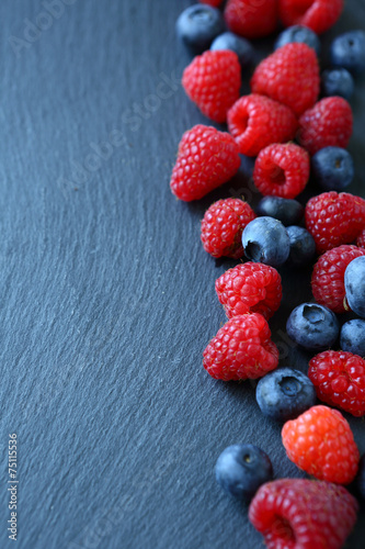 Berry mix on the slate background