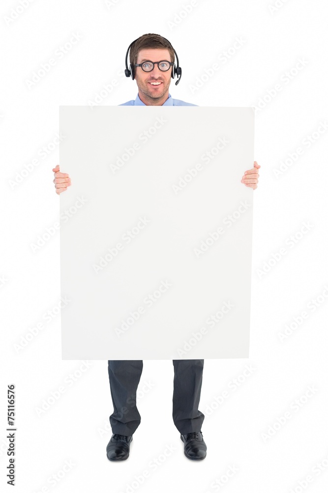 Businessman showing card wearing headset Businessman showing card wearing headset