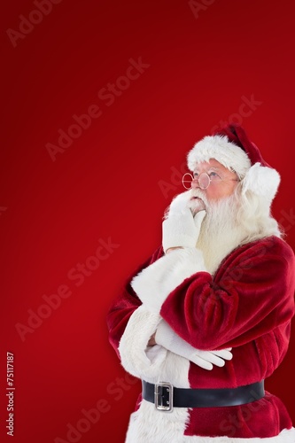 Composite image of santa is thinking about something