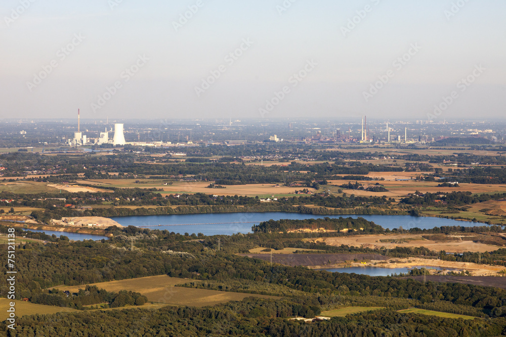 Agricultural and industrial landscape with a coal-fired power st