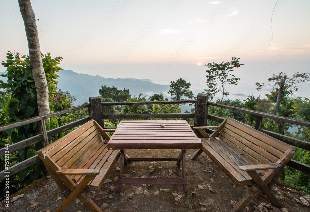 wood chair and table on balcony inthe morning at Doi Tung, Chian wood chair and table on balcony inthe morning at Doi Tung, Chian