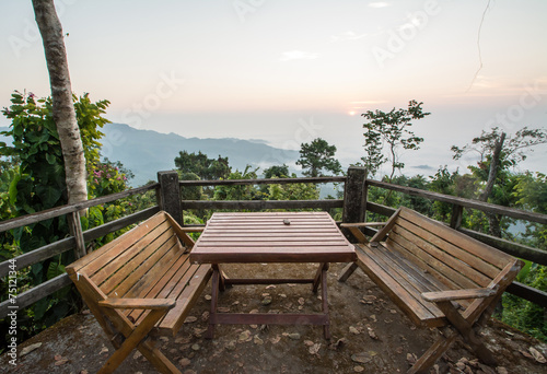 wood chair and table on balcony inthe morning at Doi Tung, Chian