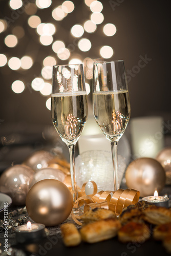 new years eve party table with two champagne flute