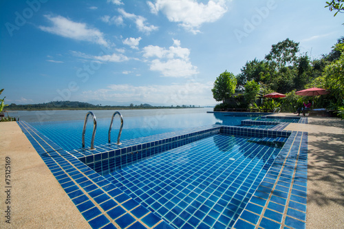 Swimming pool near Khong river with  blue sky  ,Chiangsan in Chi © Suwatchai