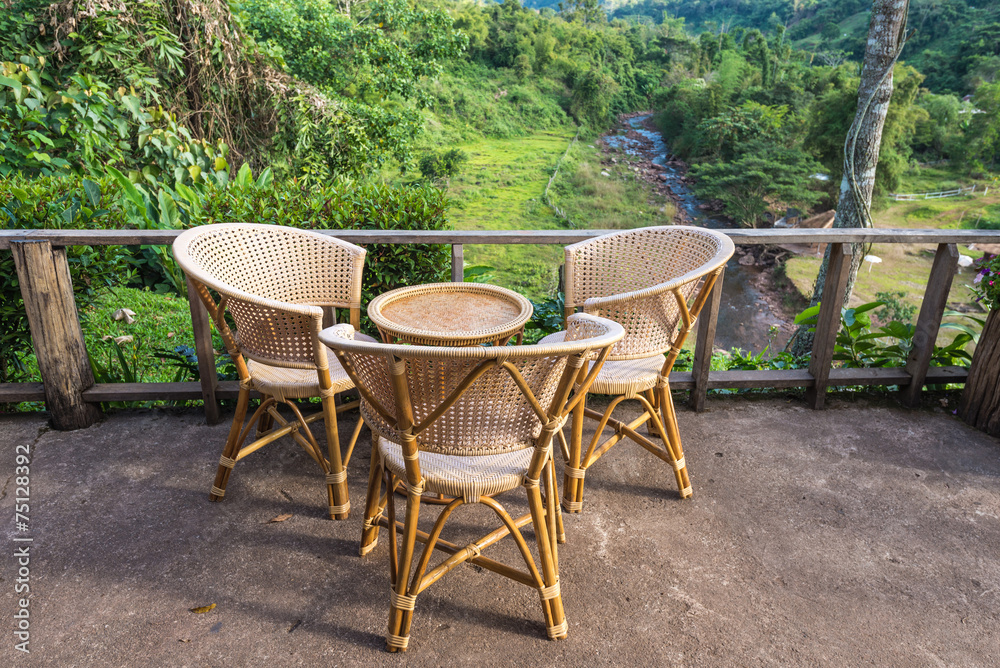 Three chairs with forest view