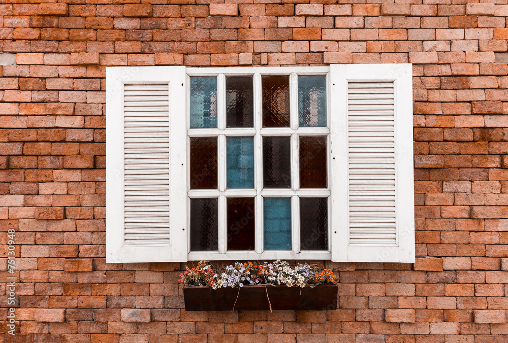 window in a red brick wall background